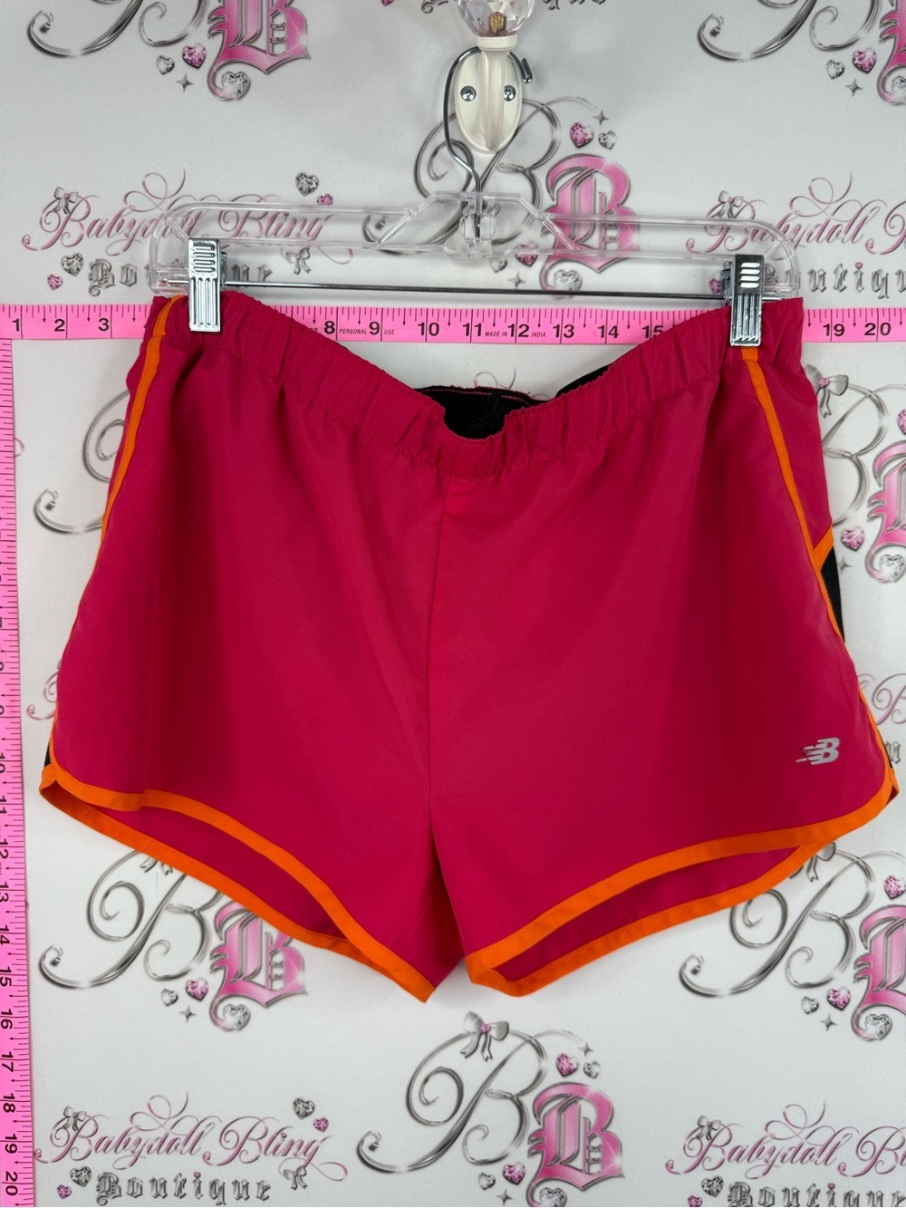 New Balance shorts Pink Athletic Shorts with Orange Trim
